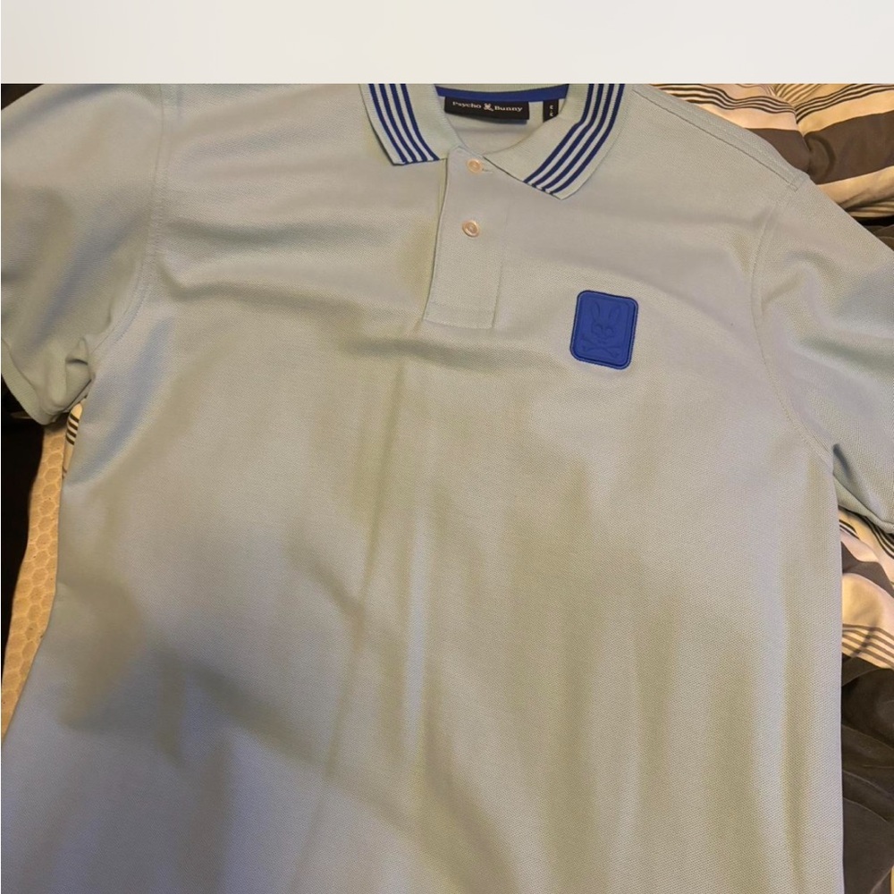 Pastel Blue Polo Shirt with Striped Collar